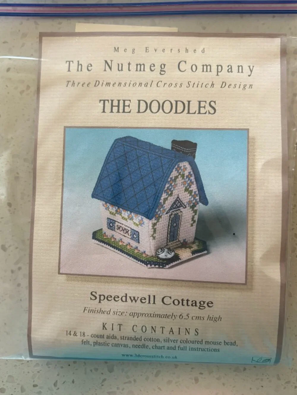 Cross stitch, three dimensional house